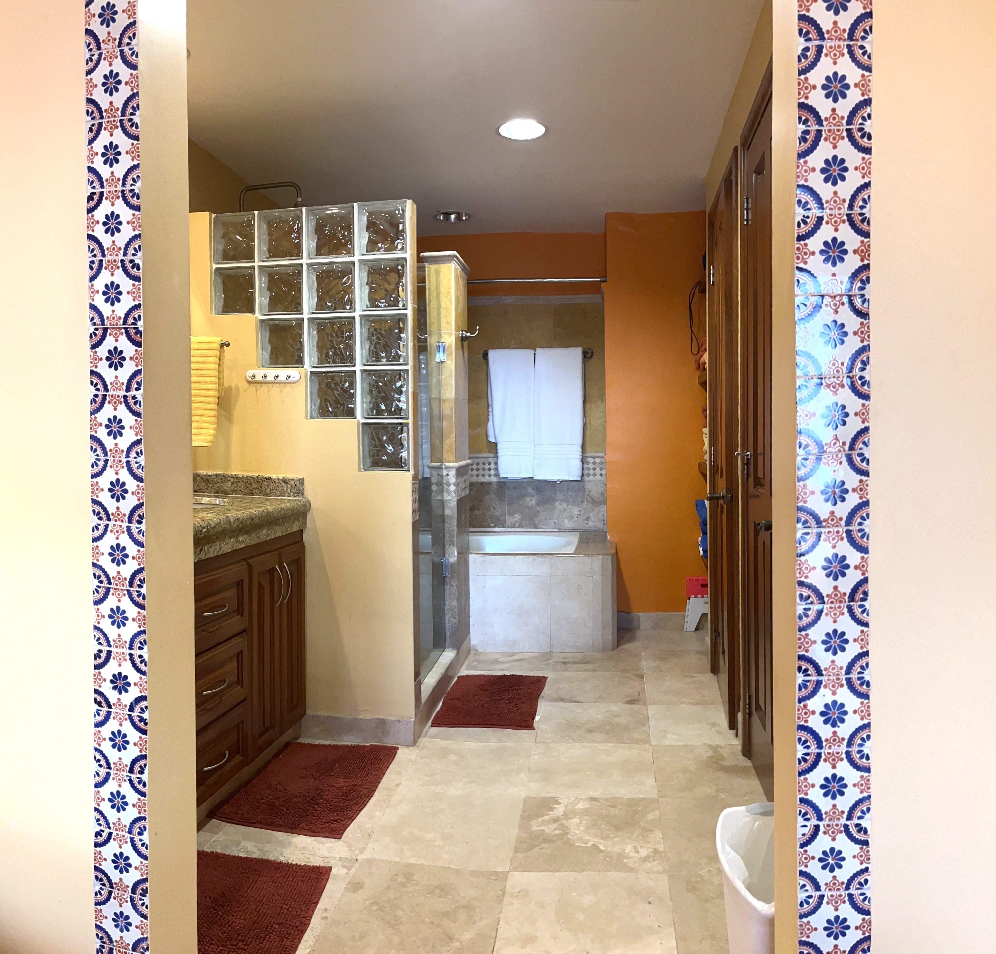 Master bedroom bath With walk-in closet, shower and bathtub, enclosed WC &  double sinks.